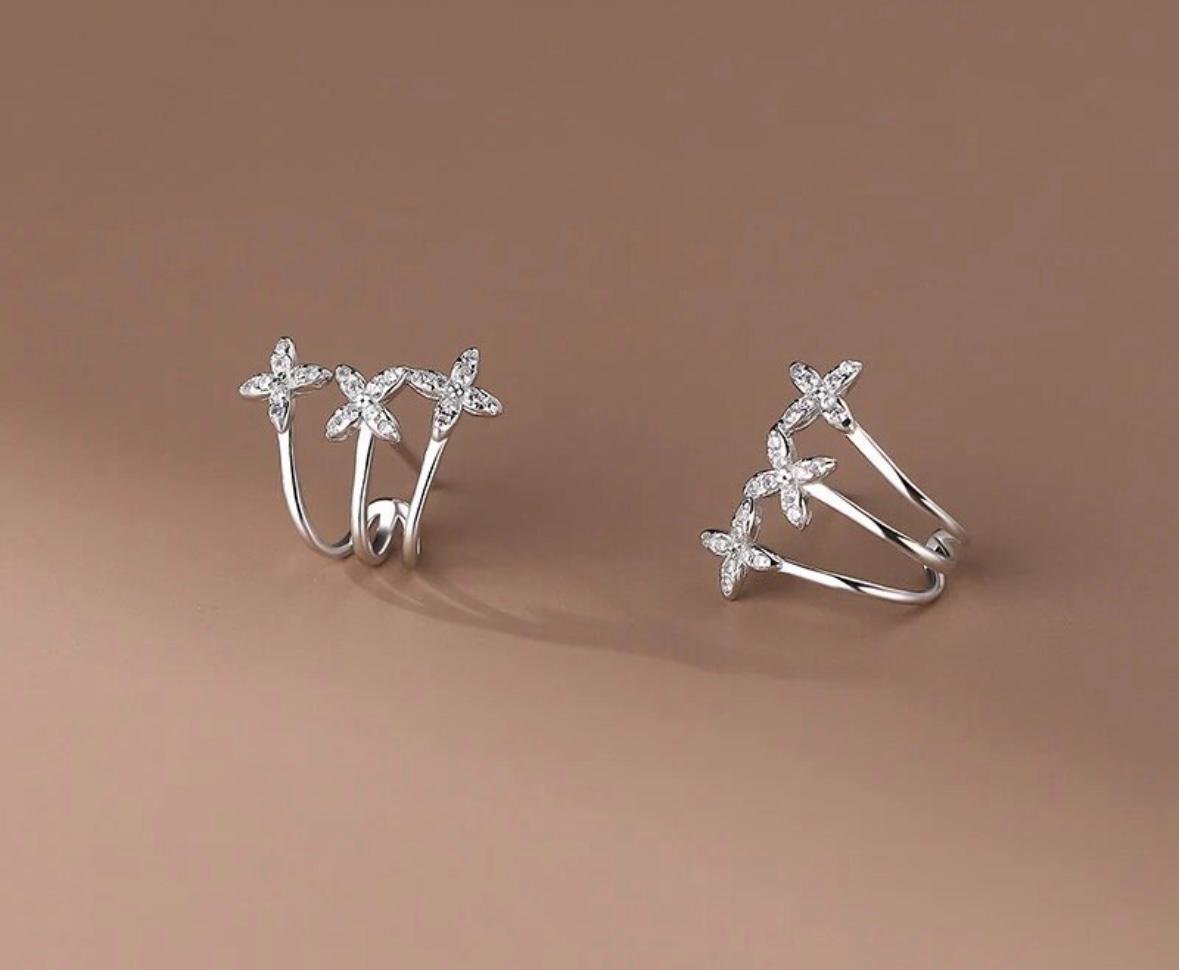 Triple silver huggy earring