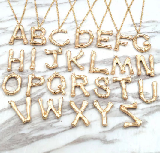 Initial necklaces