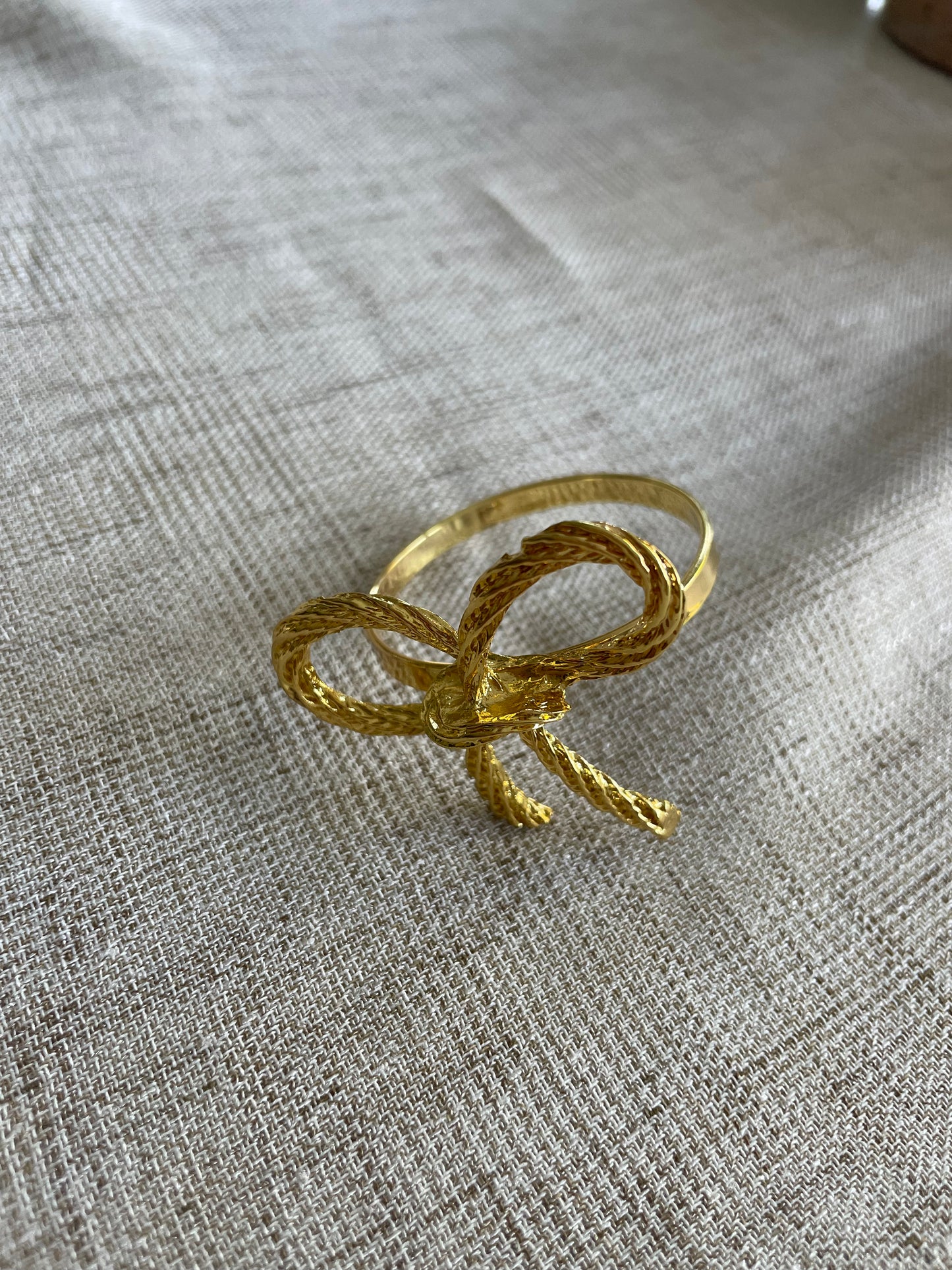 Gold bow napkin rings