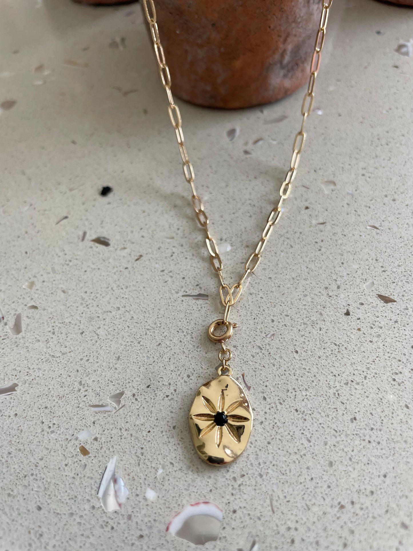 Gold link necklace with detachable charm