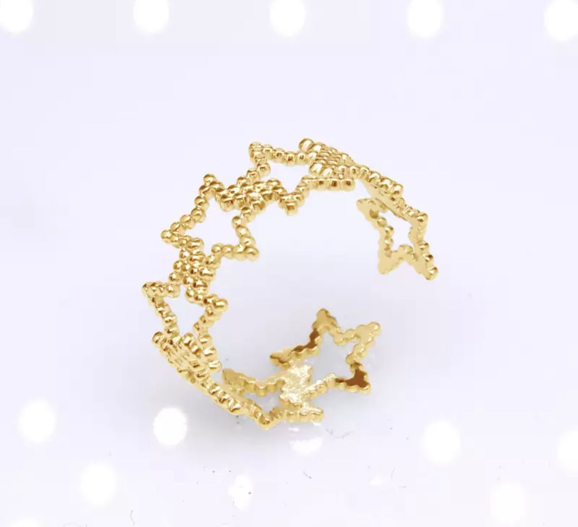 Gold star bobble ring