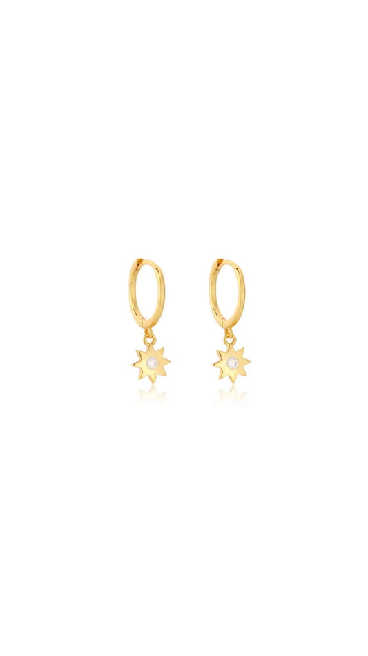 Gold star huggy earrings