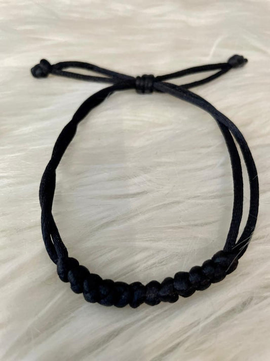 Black string bracelet