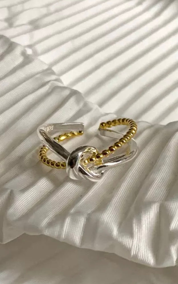 Silver and gold knot ring