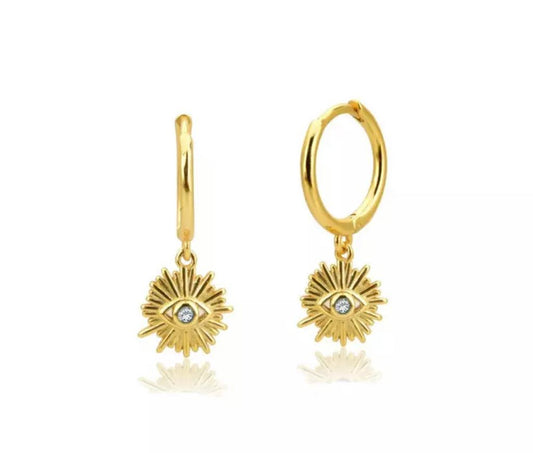 Gold eye huggy earrings