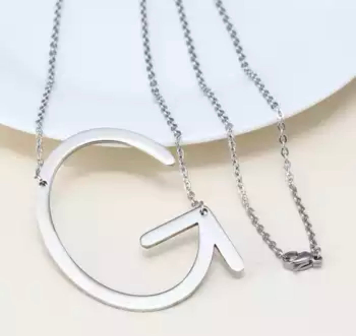 Initial necklaces