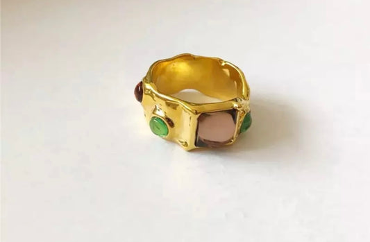 Gold ring with coloured stones